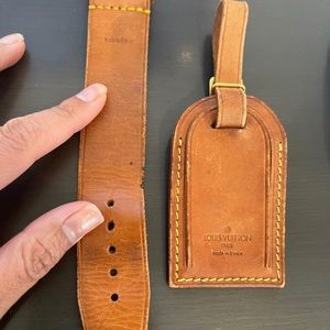 Authentic Louis Vuitton luggage tag and poignet